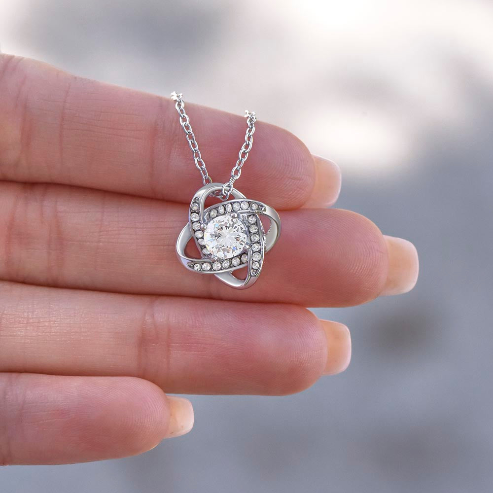 Celebrate Your Mom With Love Knot Pendant That Speaks From The Heart. Packaged With A Loving Message “Your Love Is The Most Precious Gift In My Life...”