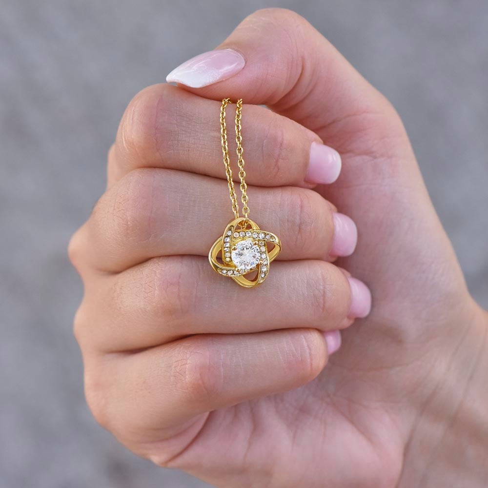 Celebrate Your Mom With Love Knot Pendant That Speaks From The Heart. Packaged With A Loving Message “Your Love Is The Most Precious Gift In My Life...”