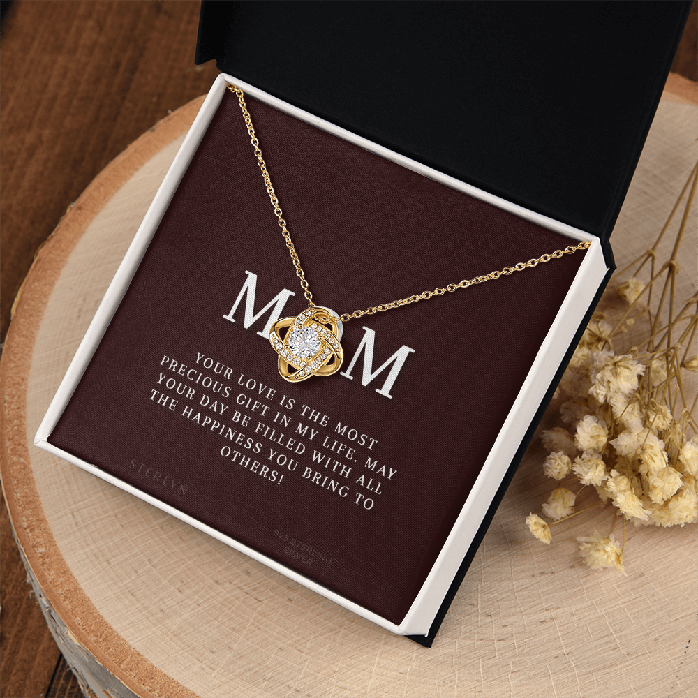 Celebrate Your Mom With Love Knot Pendant That Speaks From The Heart. Packaged With A Loving Message “Your Love Is The Most Precious Gift In My Life...”