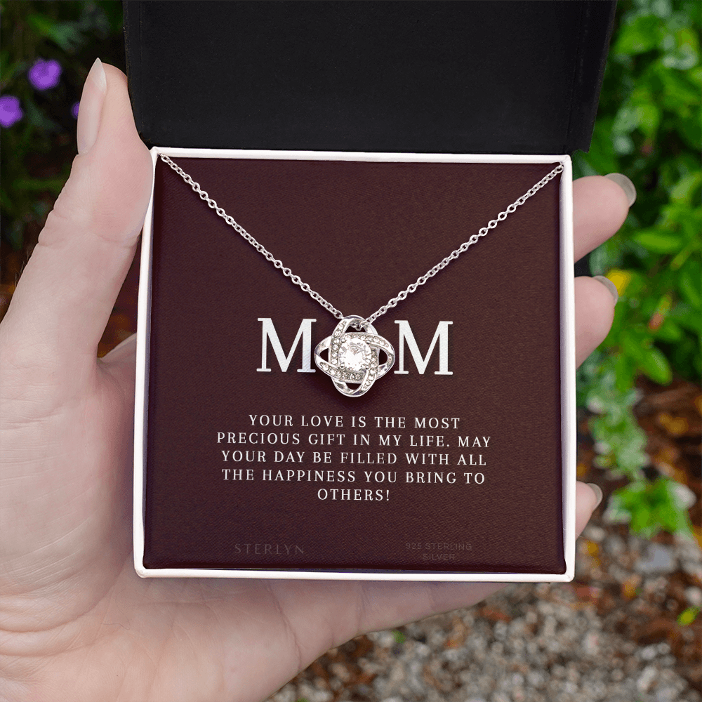 Celebrate Your Mom With Love Knot Pendant That Speaks From The Heart. Packaged With A Loving Message “Your Love Is The Most Precious Gift In My Life...”