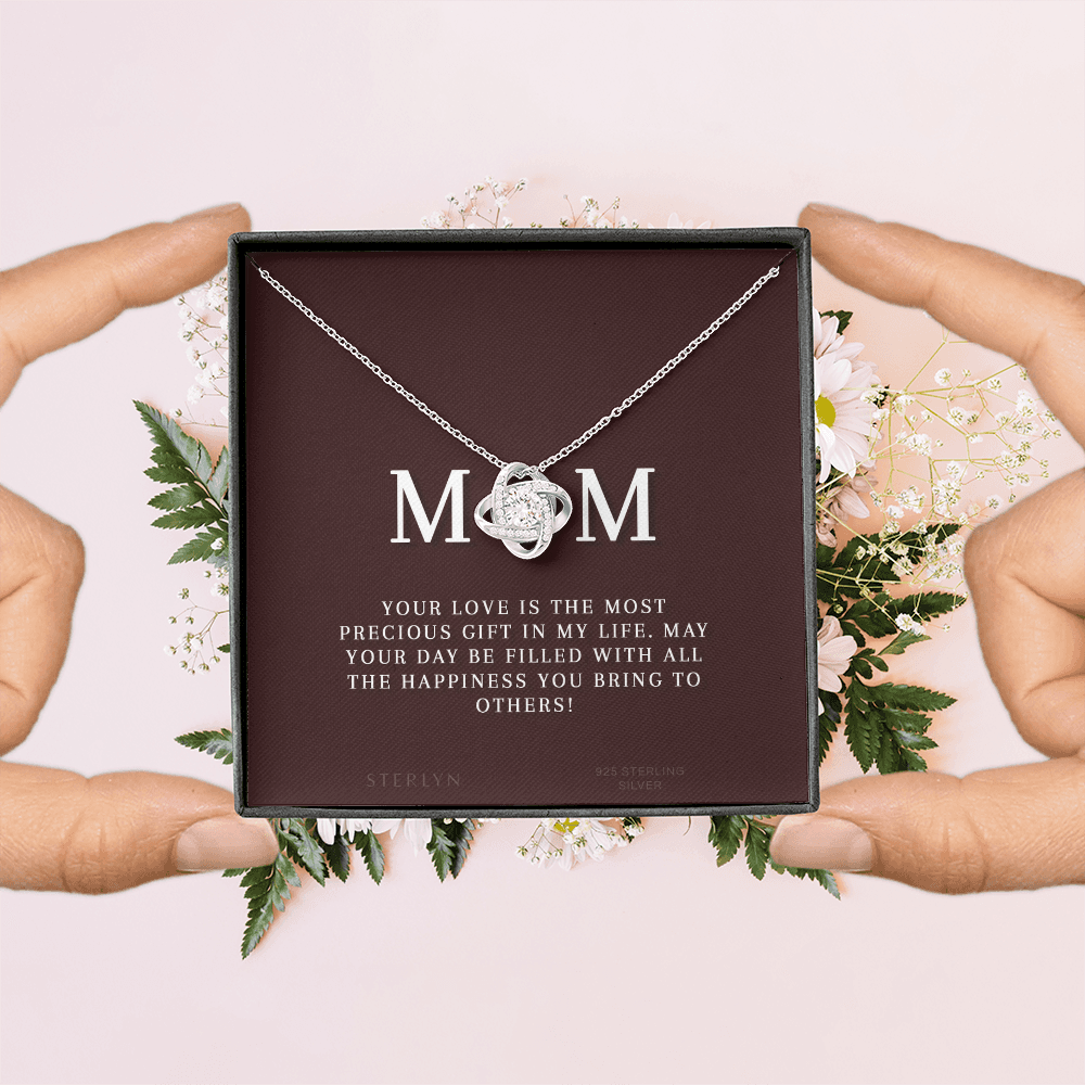 Celebrate Your Mom With Love Knot Pendant That Speaks From The Heart. Packaged With A Loving Message “Your Love Is The Most Precious Gift In My Life...”