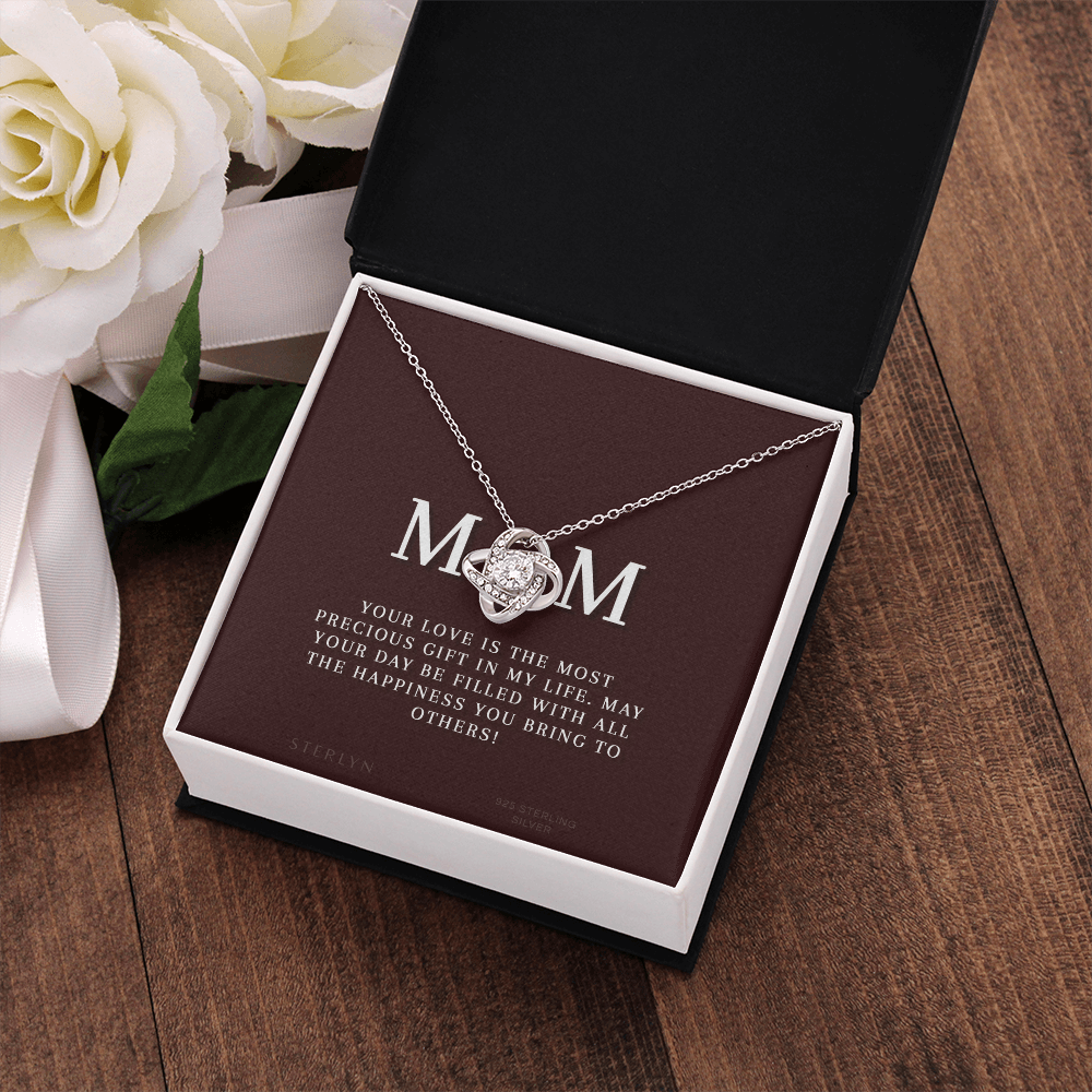 Celebrate Your Mom With Love Knot Pendant That Speaks From The Heart. Packaged With A Loving Message “Your Love Is The Most Precious Gift In My Life...”