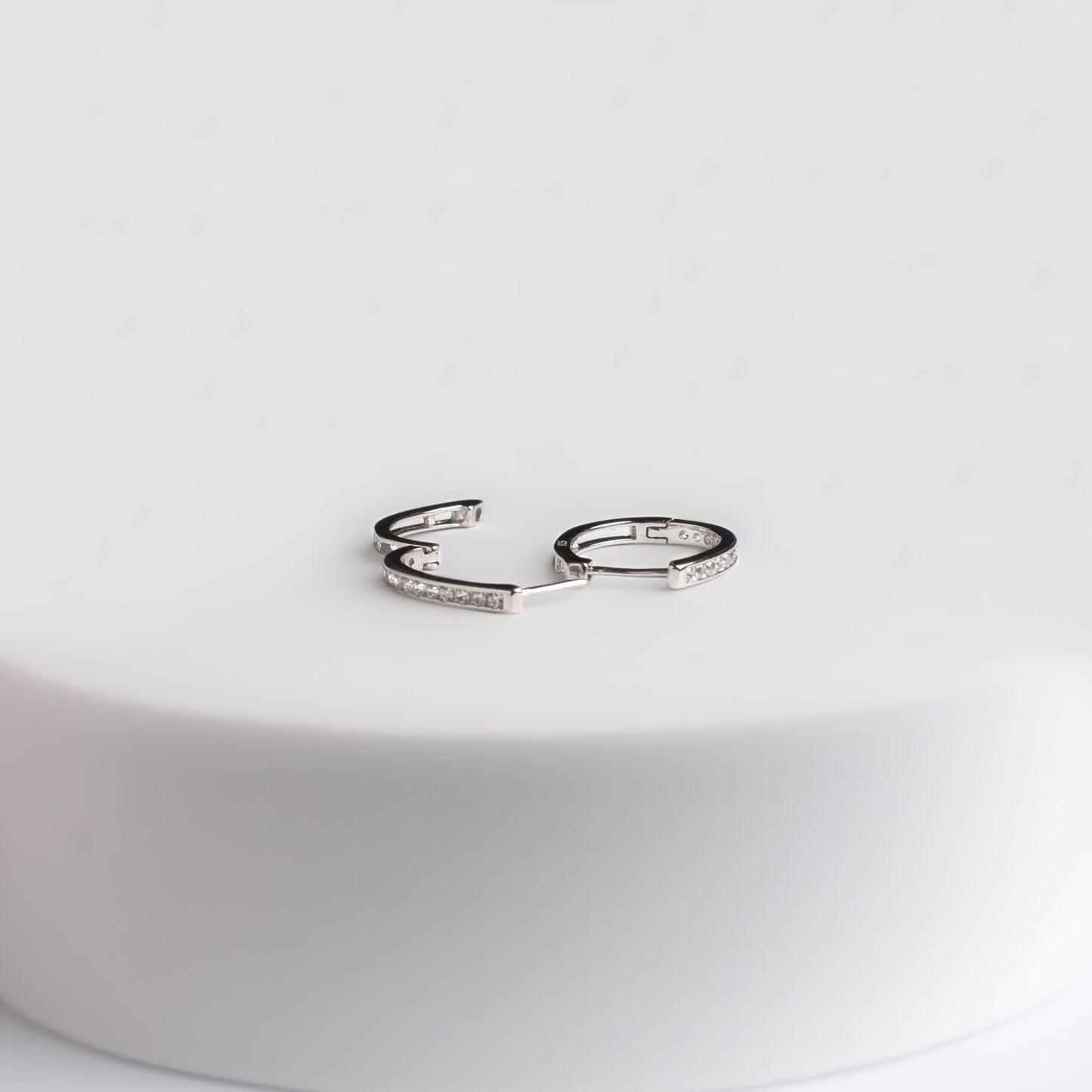 Poppy white huggies earrings