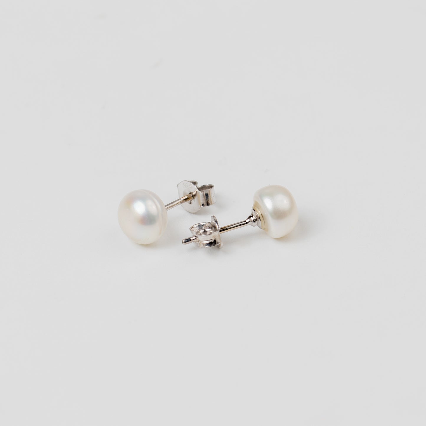 OCEANS PEARL STUDS