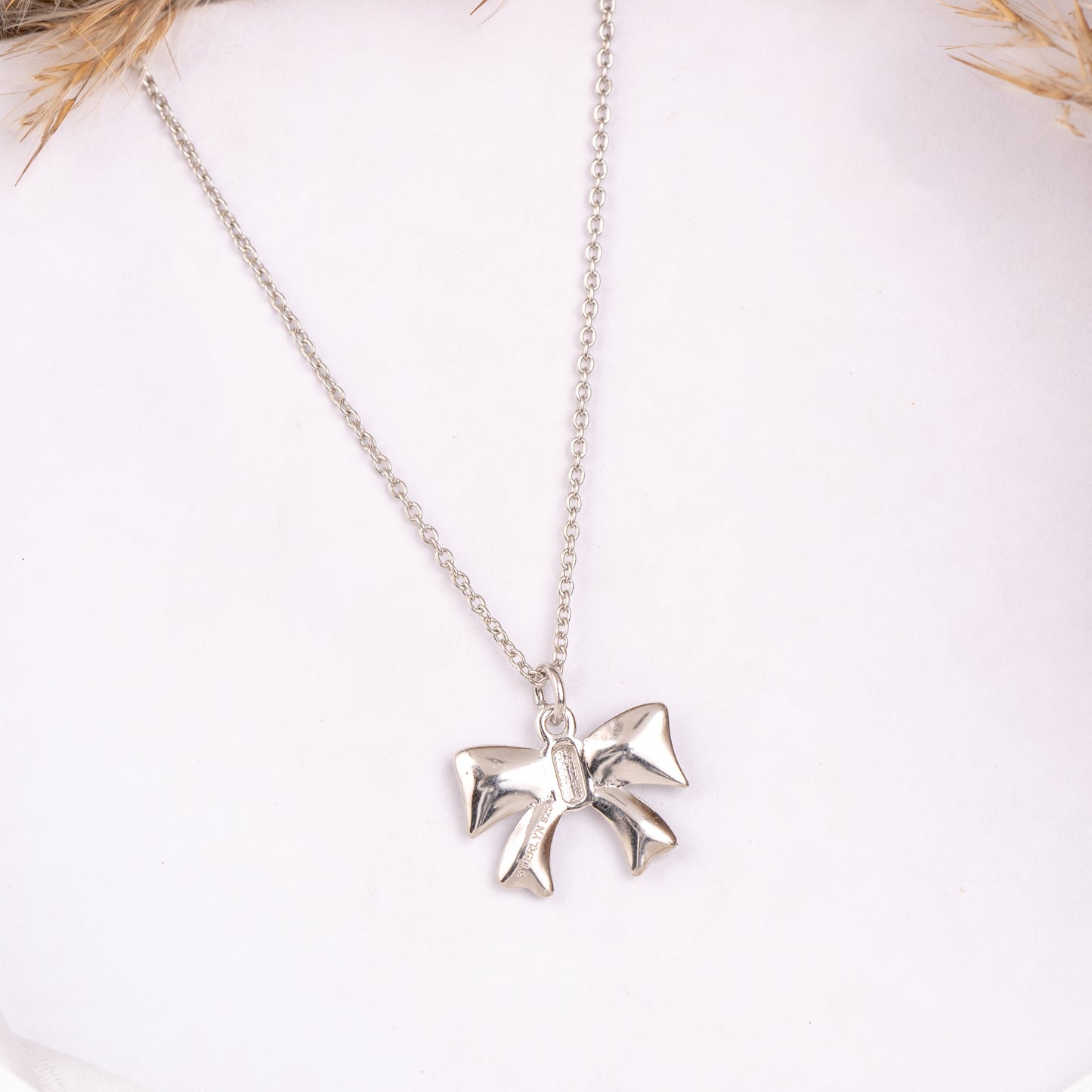 Graceful Bow Knot Pendant