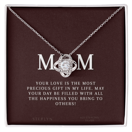Celebrate Your Mom With Love Knot Pendant That Speaks From The Heart. Packaged With A Loving Message “Your Love Is The Most Precious Gift In My Life...”